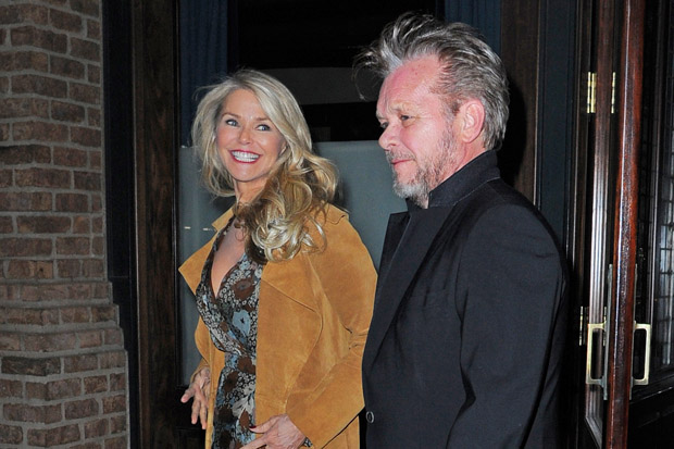 NEW YORK - FEBRUARY 02: Christie Brinkley and John Mellencamp step out of there Tribeca hotel on February 02, 2016 in New York, New York. (Photo by Josiah Kamau/BuzzFoto via Getty Images)