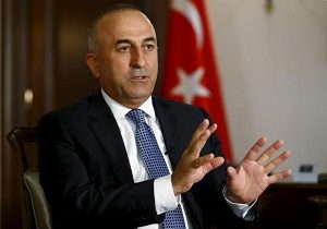 Turkey's Foreign Minister Mevlut Cavusoglu answers a question during an interview with Reuters in Ankara, Turkey, August 24, 2015. Turkey and the United States will soon launch "comprehensive" air operations to flush Islamic State fighters from a zone in northern Syria bordering Turkey, Cavusoglu told Reuters on Monday. To match Interview MIDEAST-CRISIS/TURKEY   REUTERS/Umit Bektas