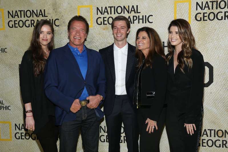 © Getty Images Christina Schwarzenegger, Arnold Schwarzenegger, Patrick Schwarzenegger, Maria Shriver and Katherine Schwarzenegger attend the premiere of National Geographic's "The Long Road Home" at Royce Hall in Los Angeles on Oct. 30, 2017.